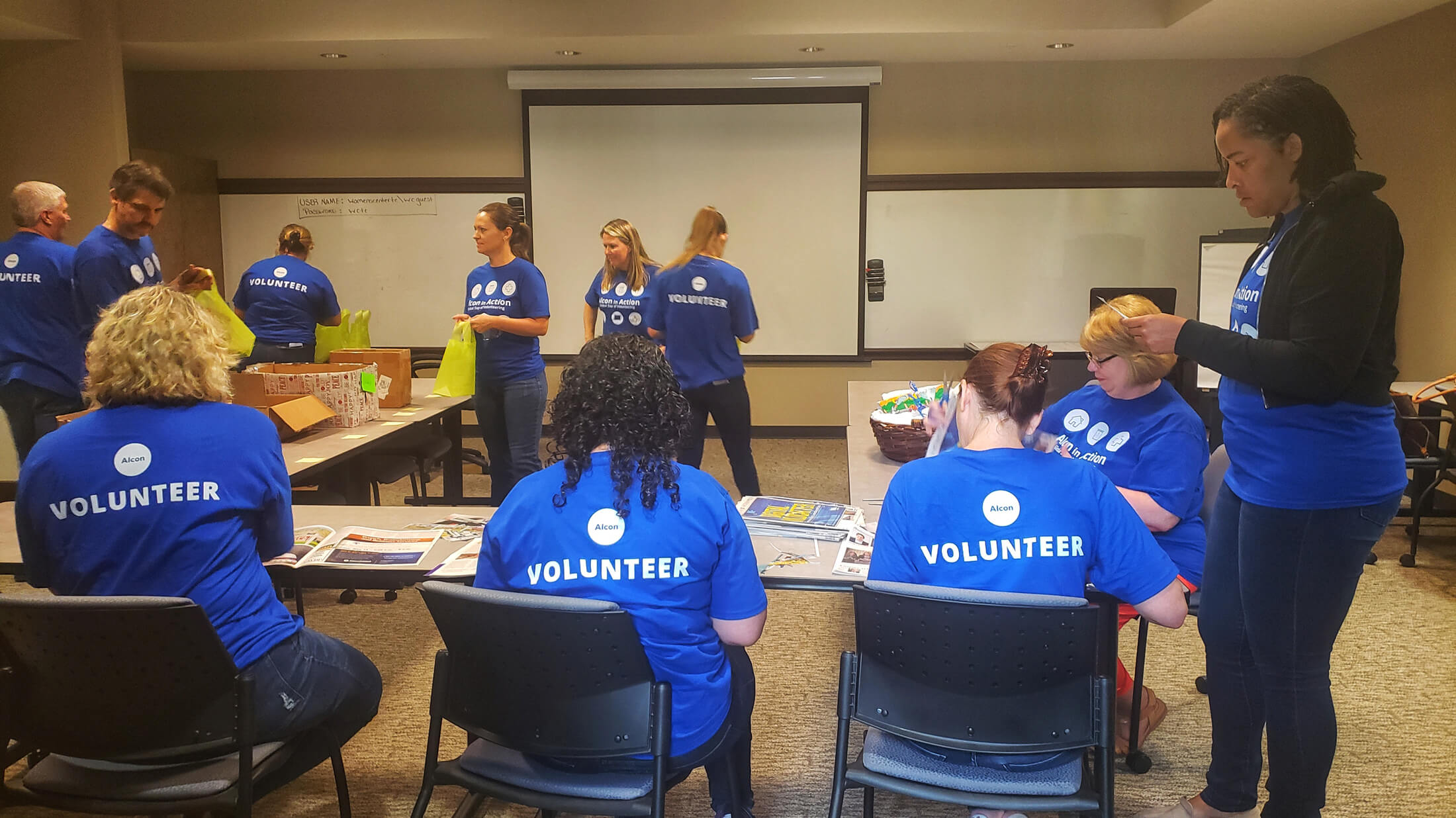 Alcon employees volunteering at The Women's Center in Fort Worth, Texas